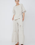 Zoila Pant in Prestine – High-waisted cotton palazzo pants with wide belt, contrast stitching, and refined silhouette.
