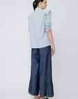 Clean back silhouette of the striped Bobi Blouse, showing the drape of the premium cotton.