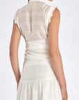 Back view of the Off White Harlow Blouse, showing the clean lines and drape of the proprietary woven fabric.