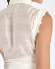 Back view of the Off White Harlow Blouse, showing the clean lines and drape of the proprietary woven fabric.
