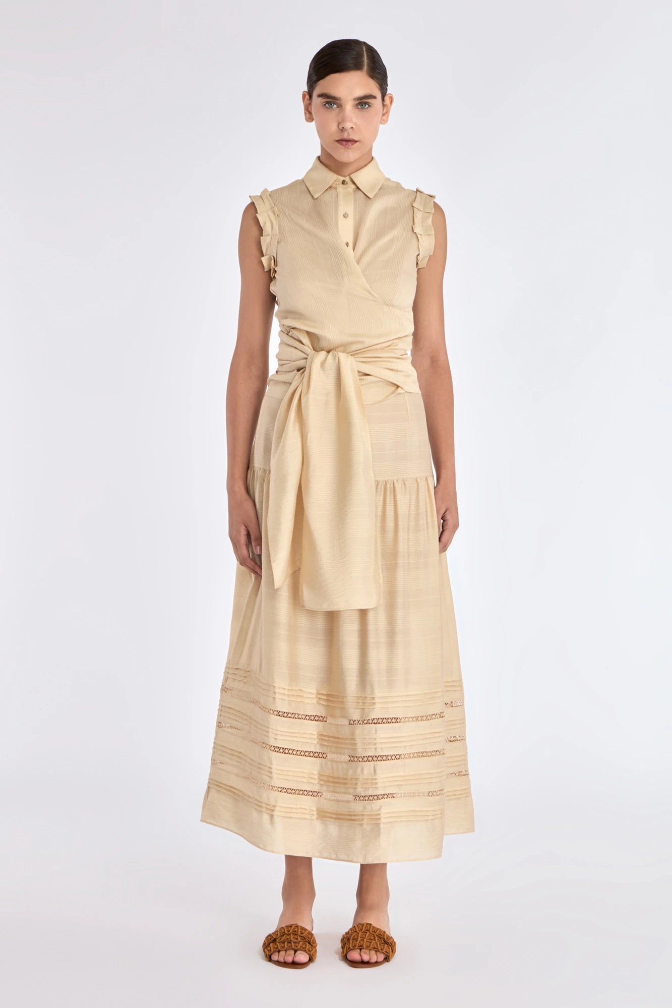 Front view of the Harlow Wrap Blouse in a soft vanilla color.