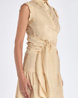 Elegant details of the vanilla Harlow Blouse, showing the shoulder pleats and wrap design.
