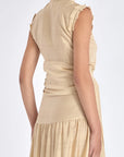 Back view of the Harlow Wrap Blouse in a soft vanilla color.