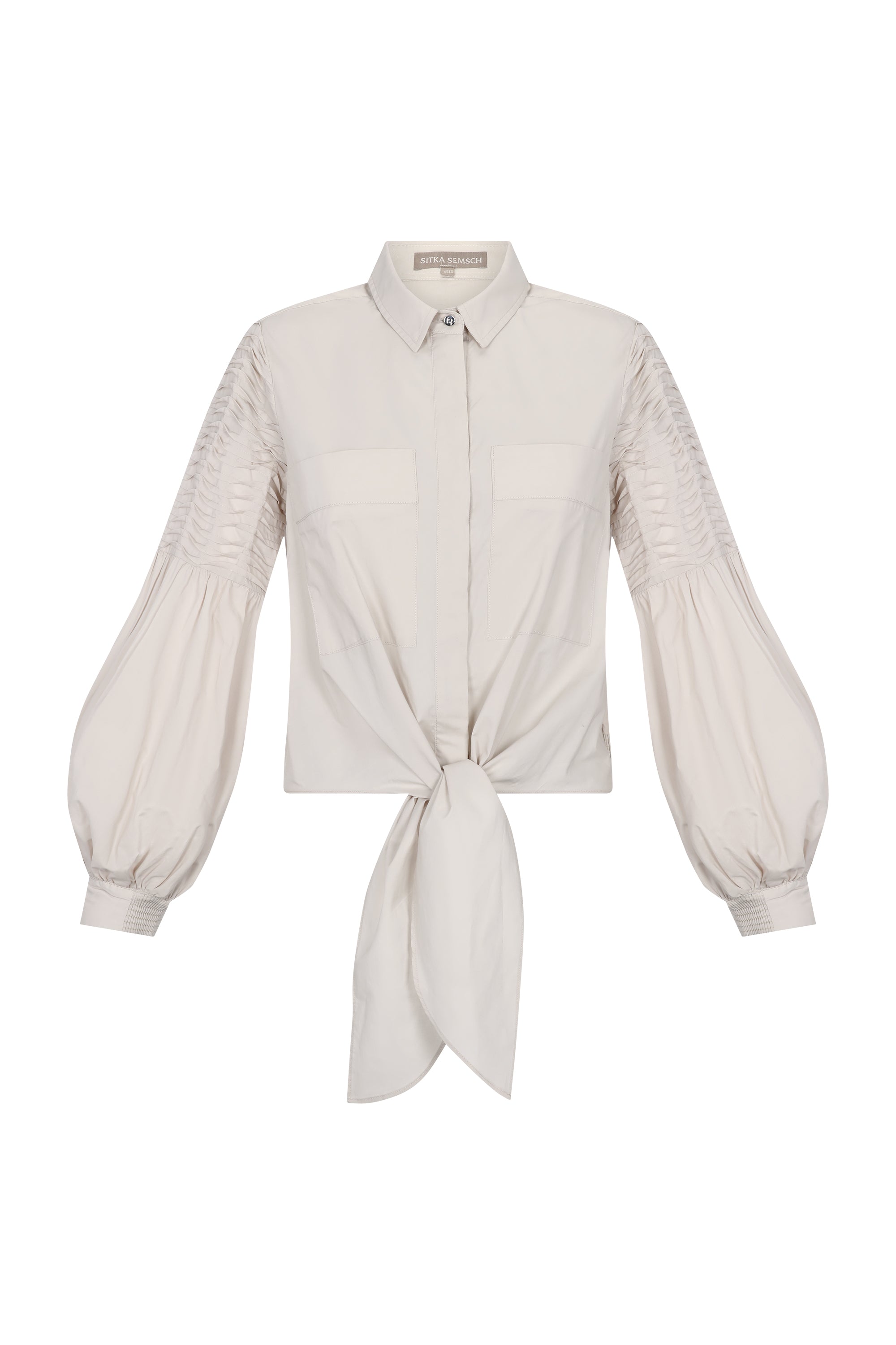 Ansley Blouse in Prestine – Lightweight cotton blouse with tie waist, balloon sleeves, and shirt collar.