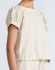 Amara blouse in prestine with broderie appliques and adjustable drawstring