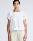 Amara blouse in white with broderie appliques and adjustable drawstring