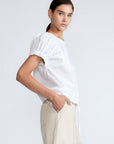 Amara blouse in white with broderie appliques and adjustable drawstring