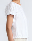 Amara blouse in white with broderie appliques and adjustable drawstring