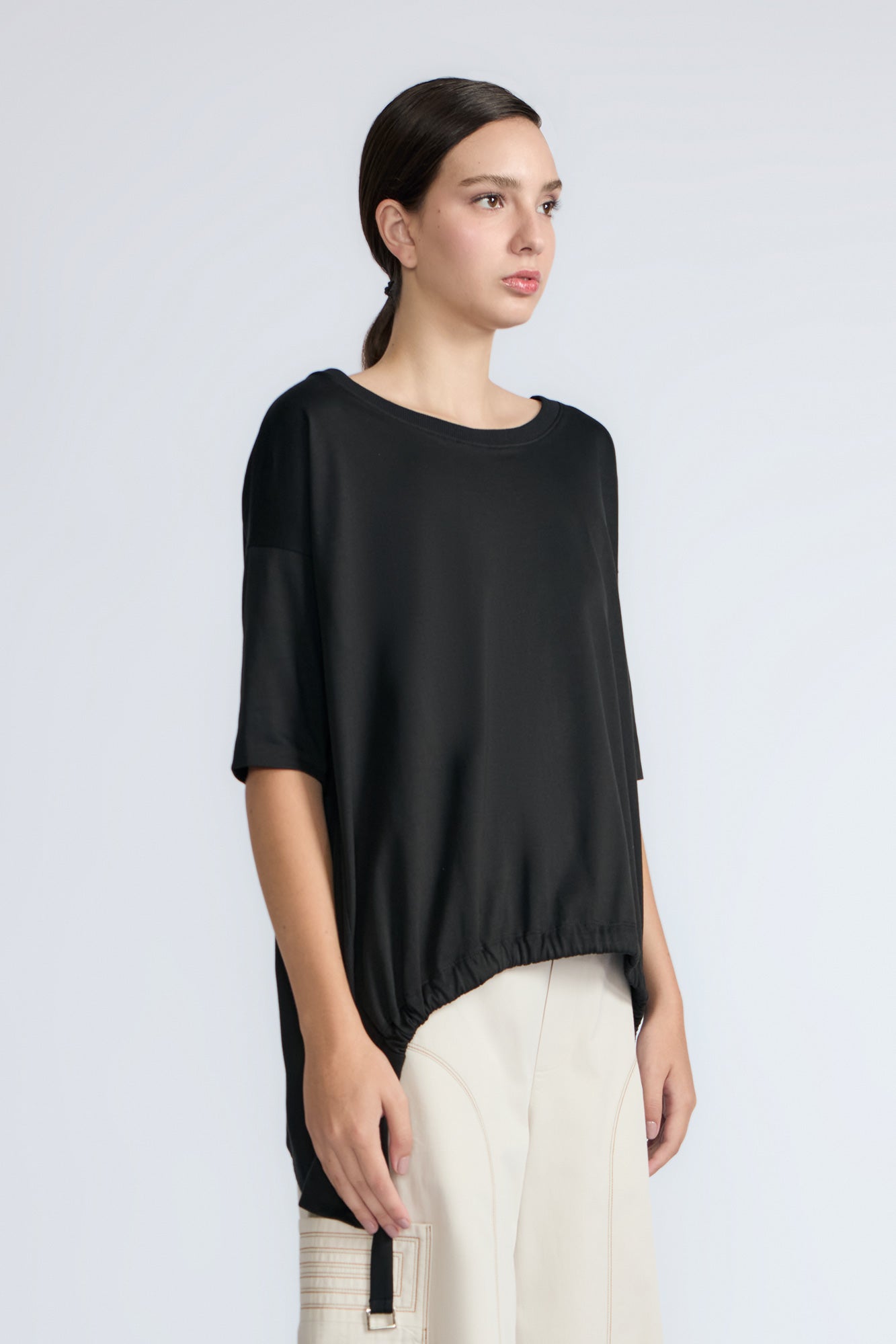 Amaya Top in Black – Round neck cotton top with short sleeves and side buckle pullers, made in Peru.