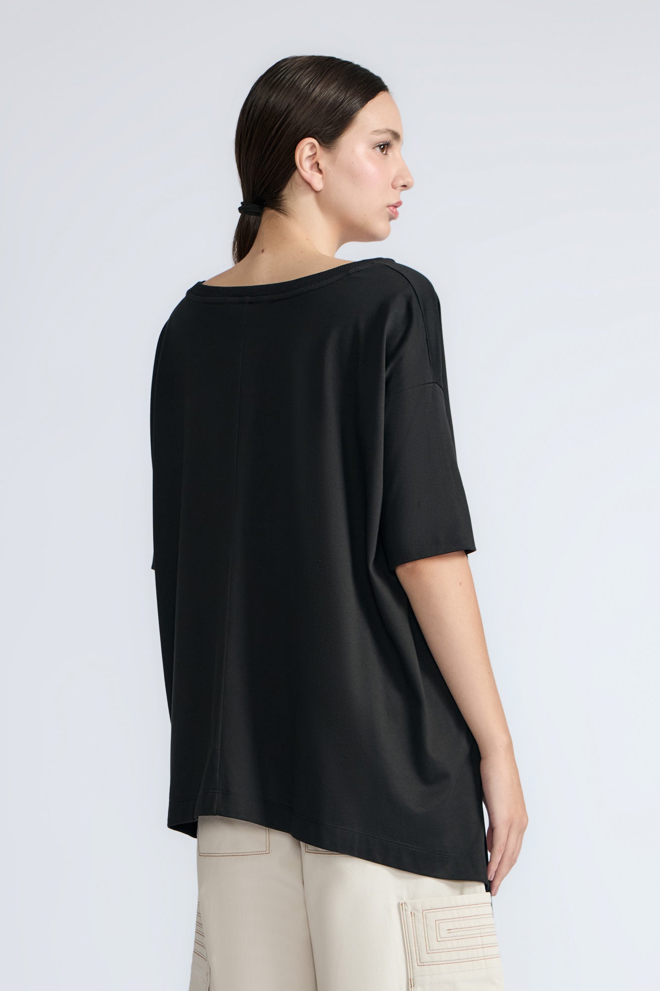 Amaya Top in Black – Round neck cotton top with short sleeves and side buckle pullers, made in Peru.