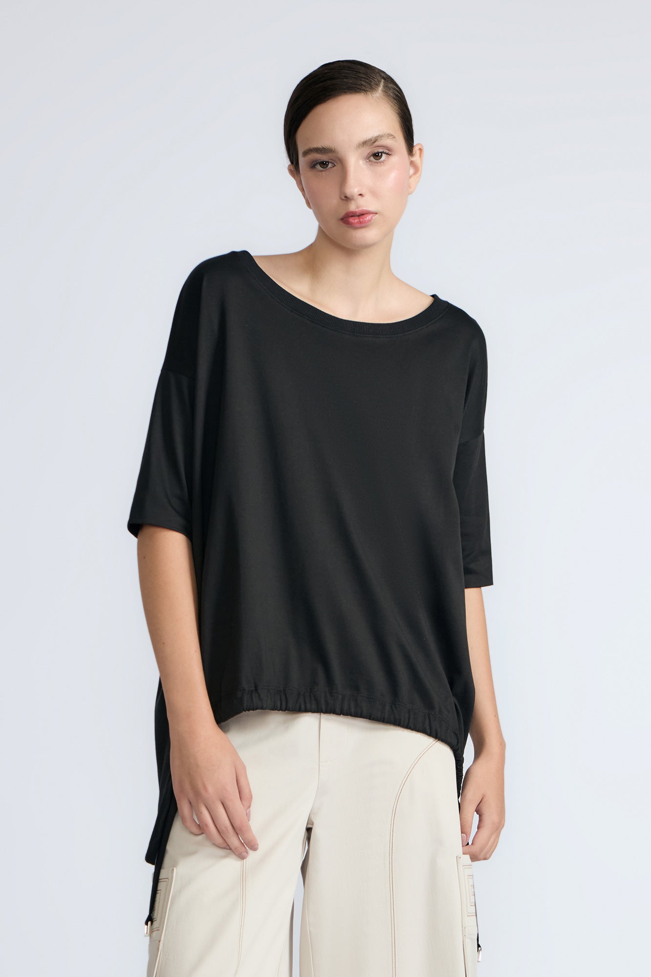 Amaya Top in Black – Round neck cotton top with short sleeves and side buckle pullers, made in Peru.