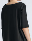 Amaya Top in Black – Round neck cotton top with short sleeves and side buckle pullers, made in Peru.