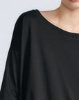 Amaya Top in Black – Round neck cotton top with short sleeves and side buckle pullers, made in Peru.