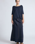 Amaya Top in Navy – Casual-chic cotton top with asymmetrical hem and hem pullers for versatile styling.