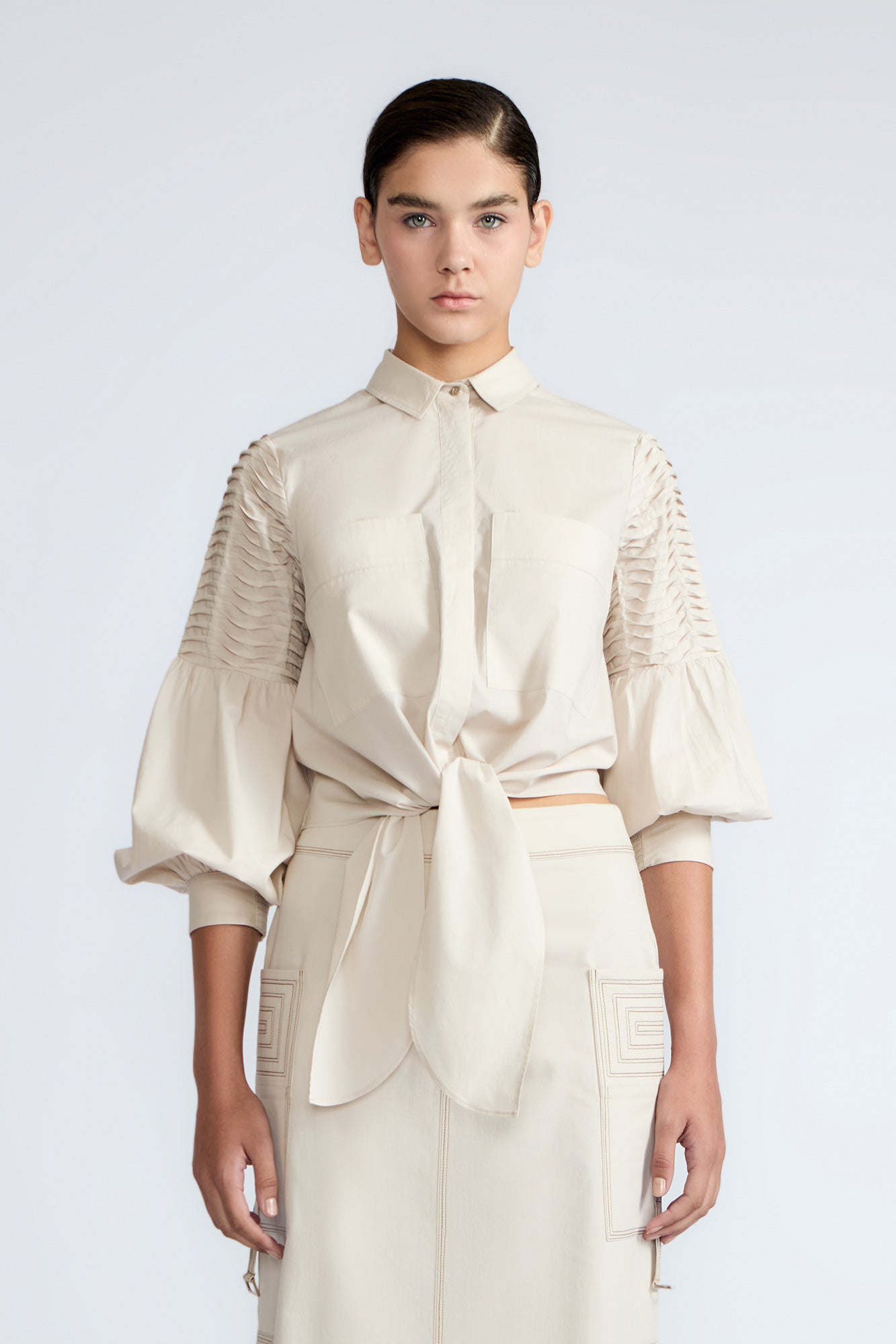 Ansley Blouse in Prestine – Lightweight cotton blouse with tie waist, balloon sleeves, and shirt collar.