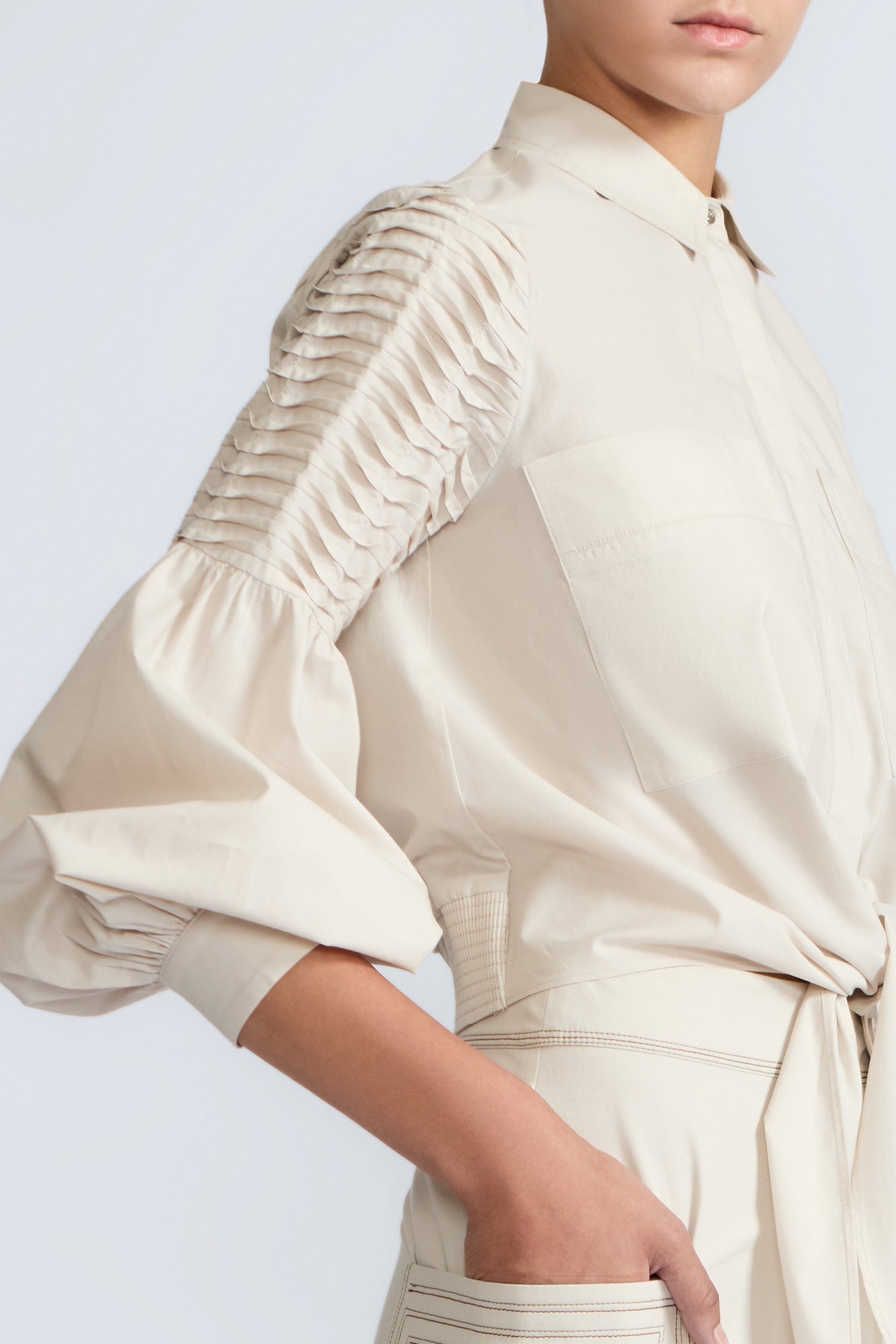 Ansley Blouse in Prestine – Lightweight cotton blouse with tie waist, balloon sleeves, and shirt collar.
