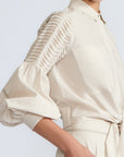 Ansley Blouse in Prestine – Lightweight cotton blouse with tie waist, balloon sleeves, and shirt collar.