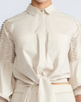 Ansley Blouse in Prestine – Lightweight cotton blouse with tie waist, balloon sleeves, and shirt collar.