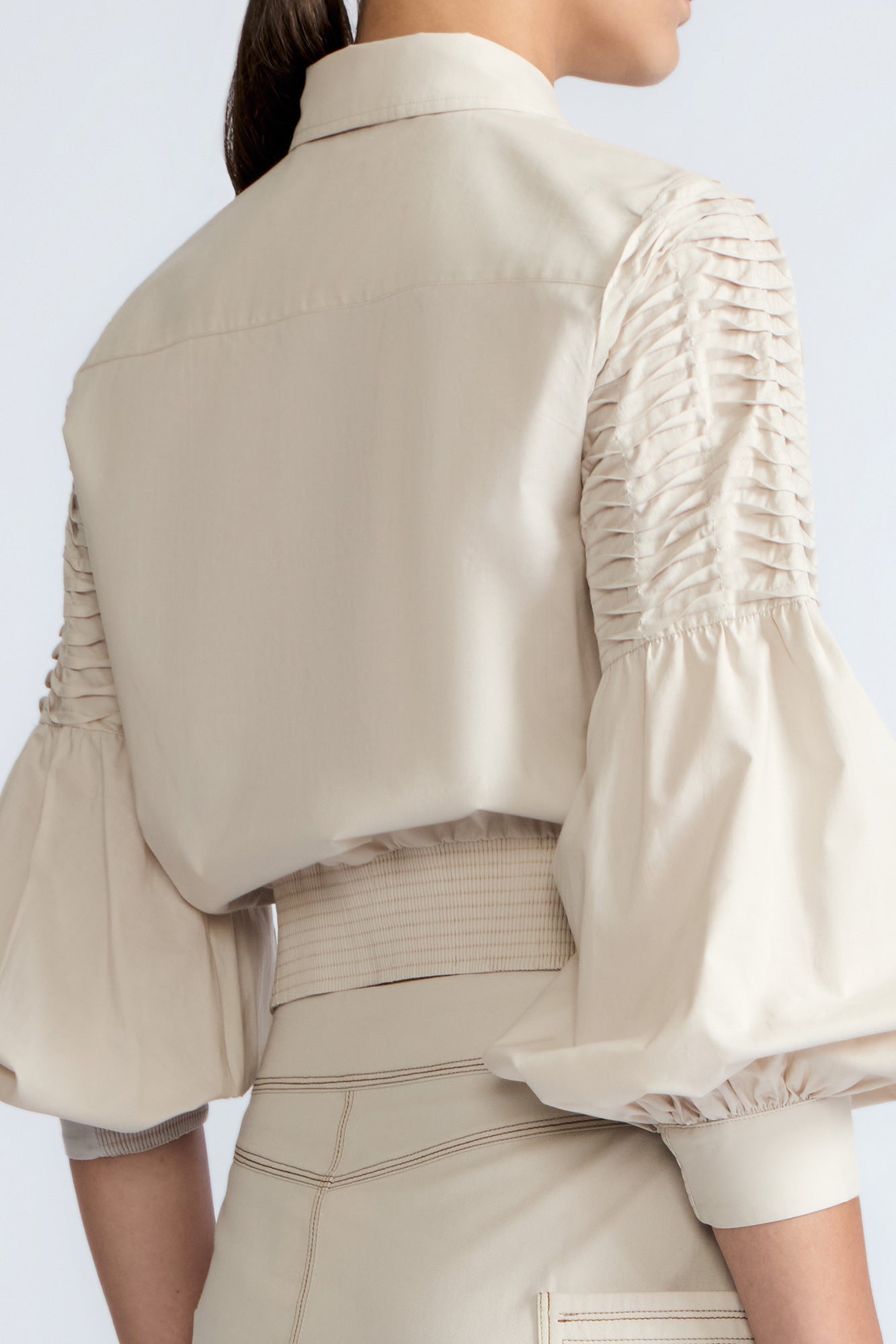 Ansley Blouse in Prestine – Lightweight cotton blouse with tie waist, balloon sleeves, and shirt collar.