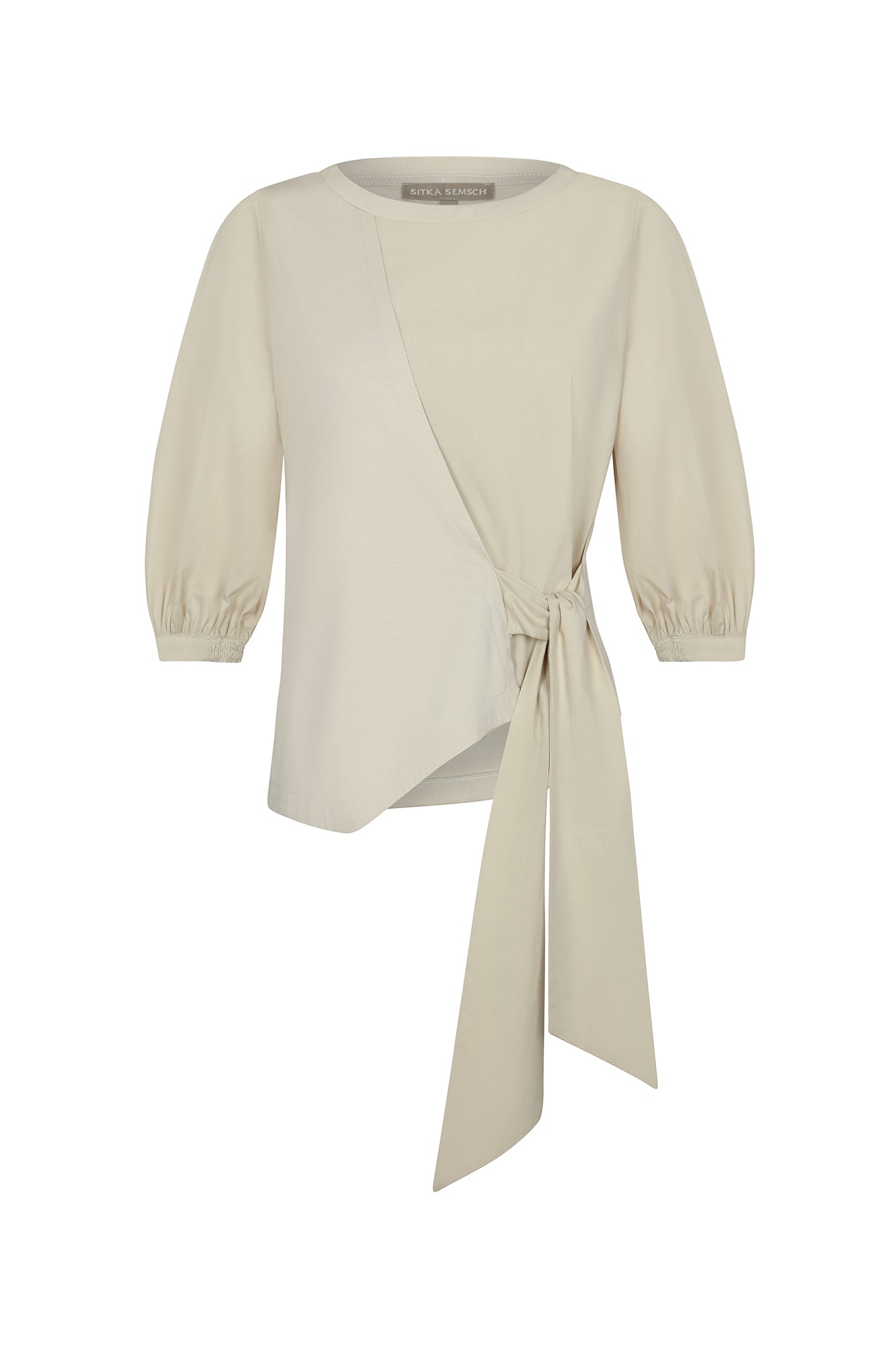 Artemisa Top in Prestine – 100% cotton top with round neckline, wrap tie at the waist, and ¾ sleeves.