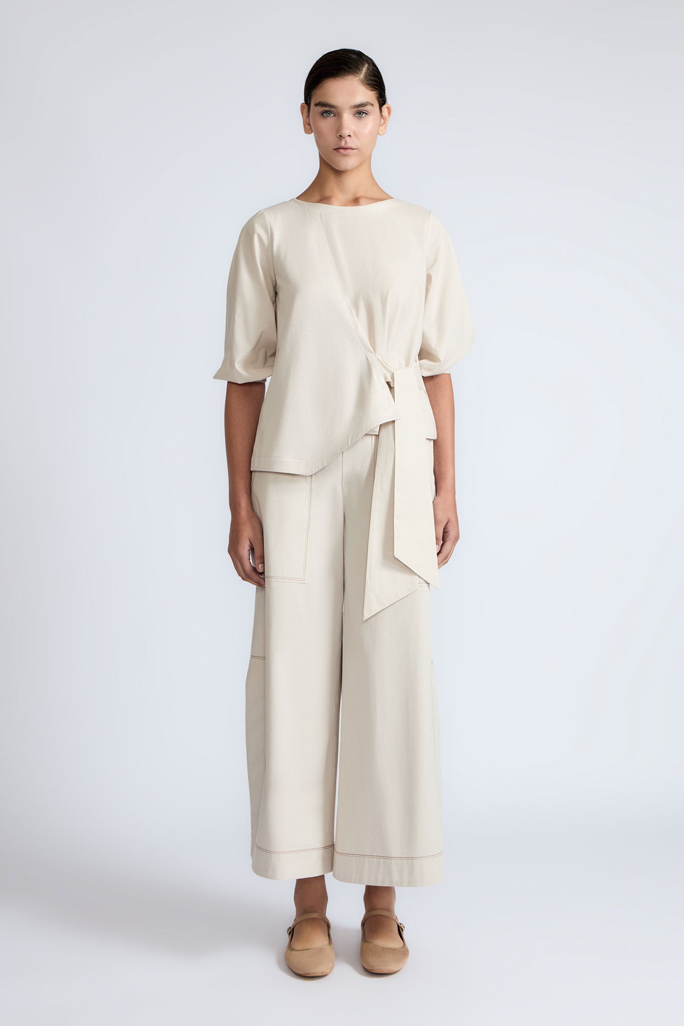 Artemisa Top in Prestine – 100% cotton top with round neckline, wrap tie at the waist, and ¾ sleeves.