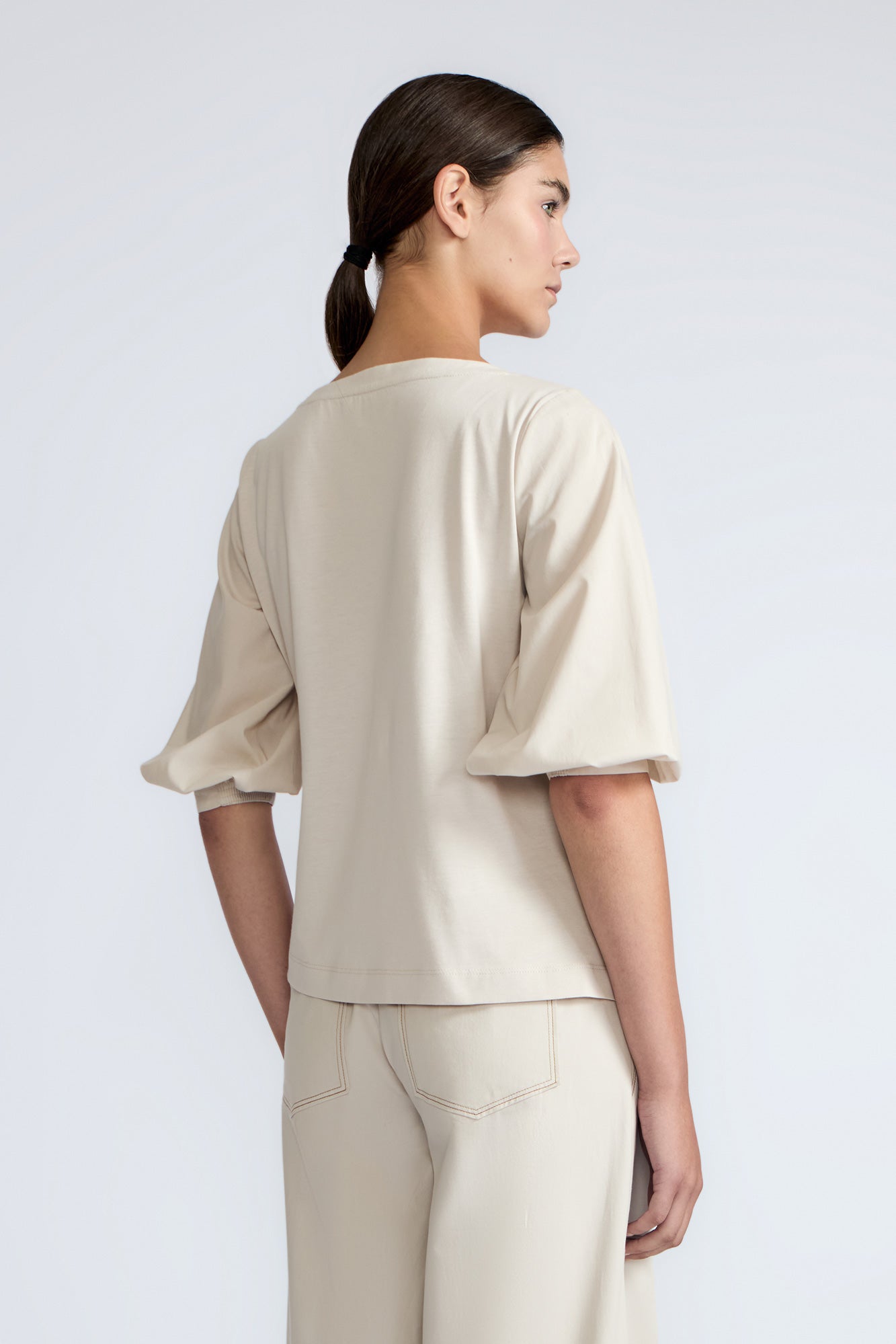 Artemisa Top in Prestine – 100% cotton top with round neckline, wrap tie at the waist, and ¾ sleeves.