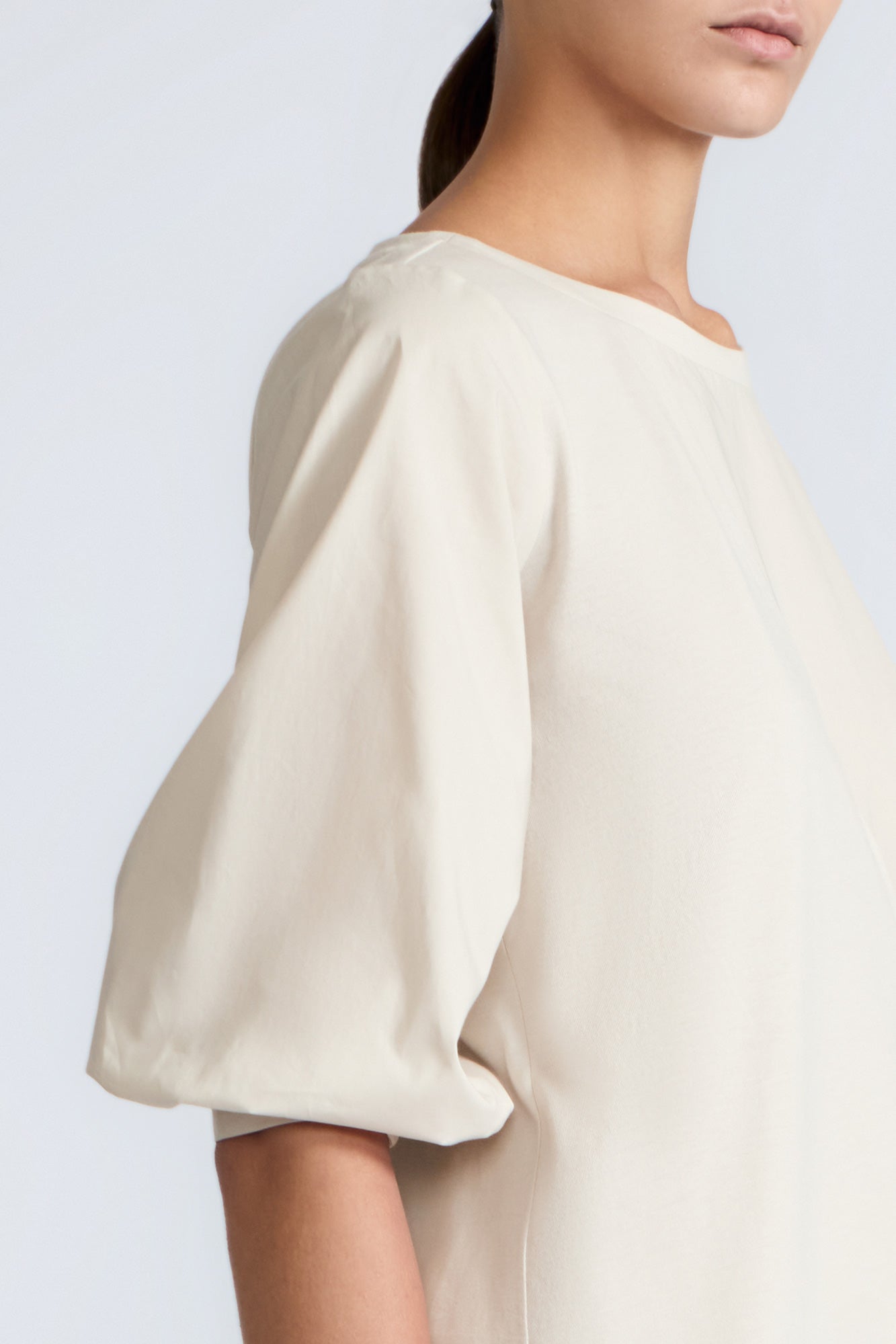 Artemisa Top in Prestine – 100% cotton top with round neckline, wrap tie at the waist, and ¾ sleeves.