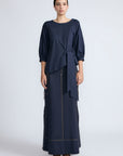 Artemisa Top in Navy – Cotton wrap top with round neckline, ¾ sleeves, and tie waist, made in Peru.