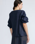 Artemisa Top in Navy – Cotton wrap top with round neckline, ¾ sleeves, and tie waist, made in Peru.