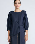 Artemisa Top in Navy – Cotton wrap top with round neckline, ¾ sleeves, and tie waist, made in Peru.