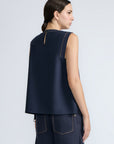 Avayah Top in Navy – 100% cotton sleeveless top with round neckline, shoulder button accents, and drawstring hem.