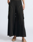 Bela Pant in Black – Cropped cotton palazzo pants with side flap pockets, elasticated waist, and contrast stitching.