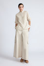 Bela Pant in Prestine – Cropped cotton palazzo pants with side flap pockets, elasticated waist, and contrast stitching.