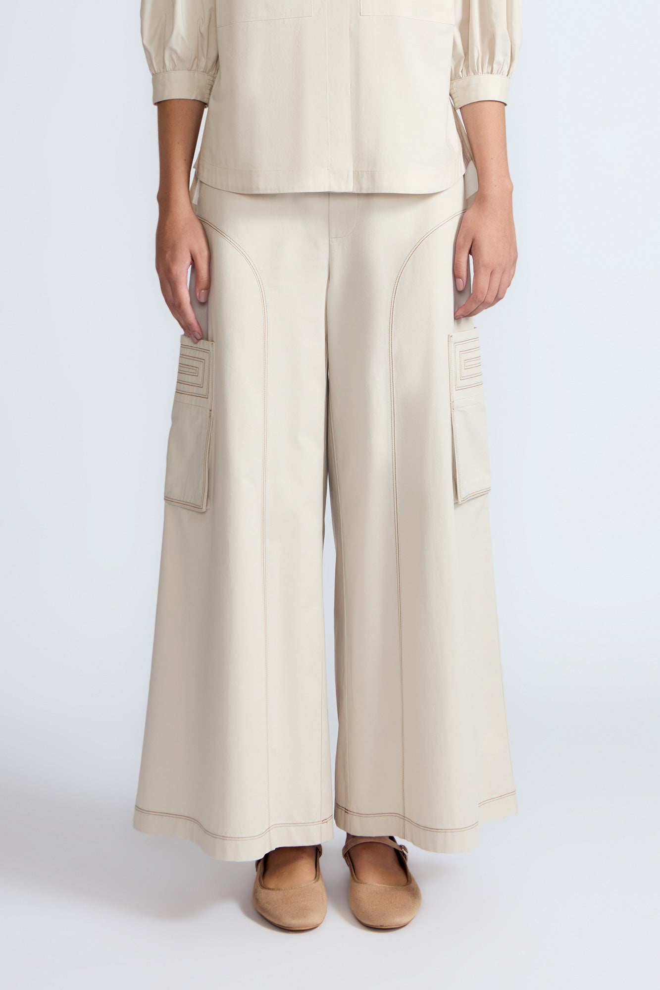 Bela Pant in Prestine – Cropped cotton palazzo pants with side flap pockets, elasticated waist, and contrast stitching.