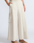 Bela Pant in Prestine – Cropped cotton palazzo pants with side flap pockets, elasticated waist, and contrast stitching.