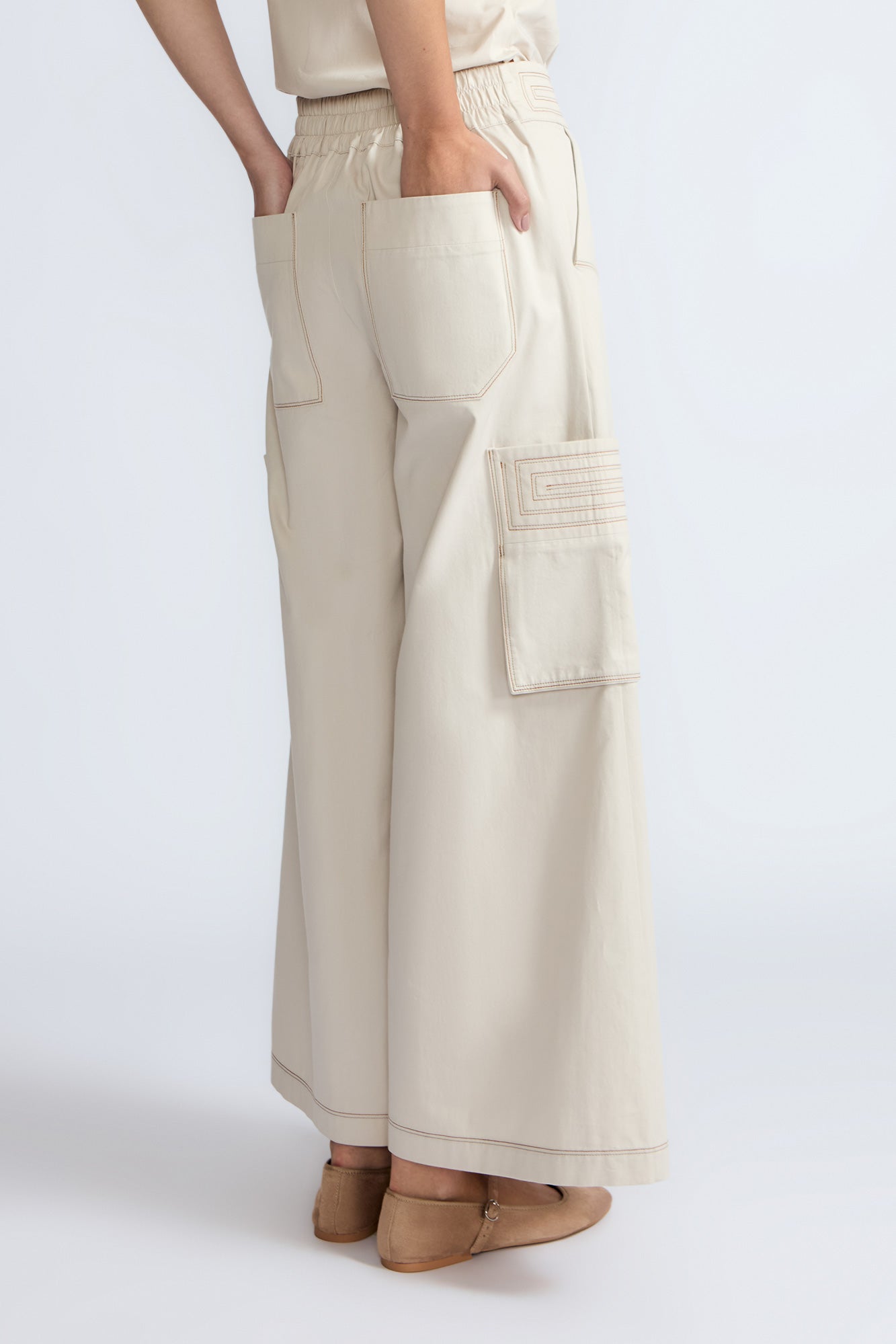 Bela Pant in Prestine – Cropped cotton palazzo pants with side flap pockets, elasticated waist, and contrast stitching.