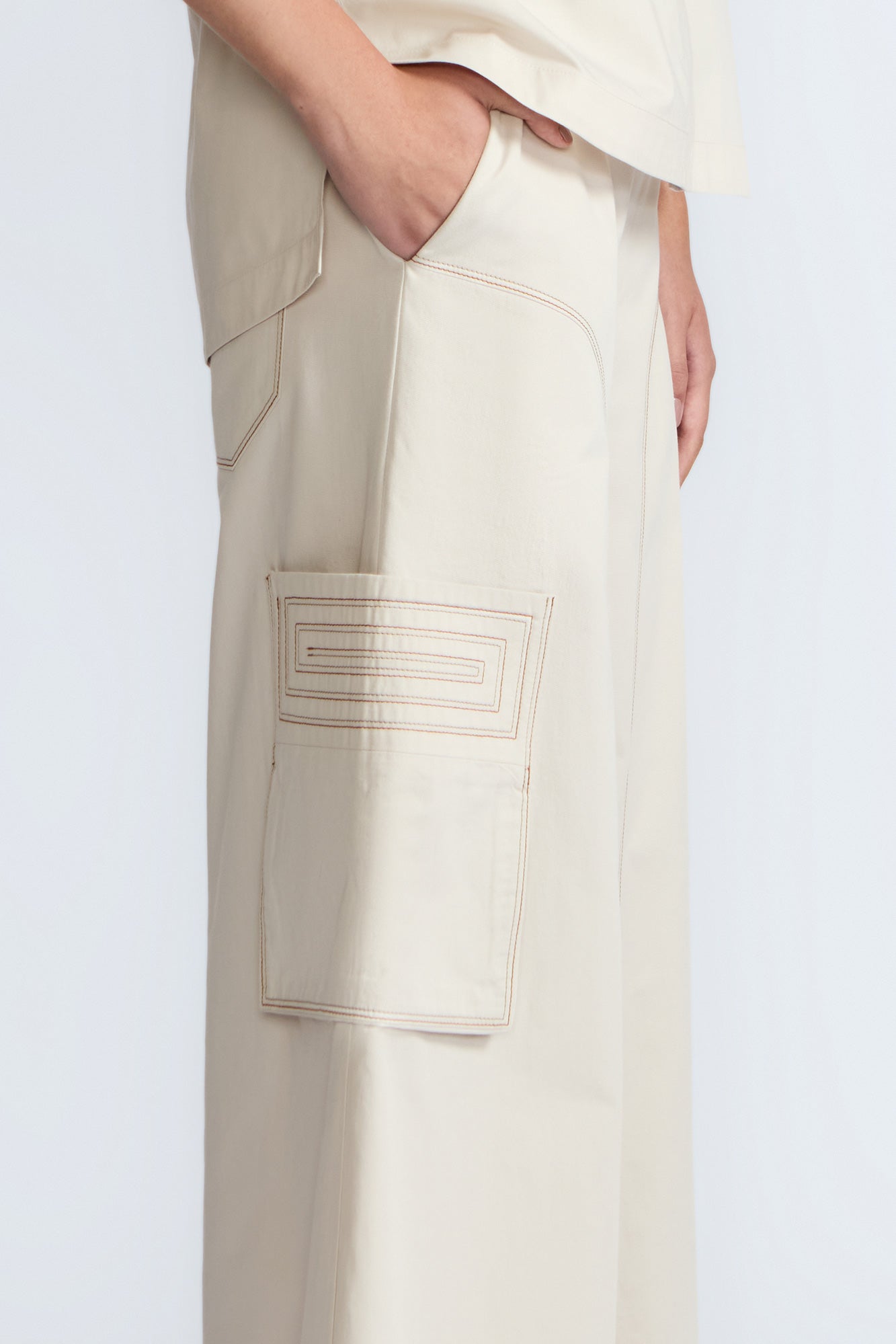 Bela Pant in Prestine – Cropped cotton palazzo pants with side flap pockets, elasticated waist, and contrast stitching.