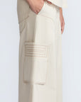 Bela Pant in Prestine – Cropped cotton palazzo pants with side flap pockets, elasticated waist, and contrast stitching.
