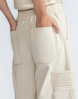 Bela Pant in Prestine – Cropped cotton palazzo pants with side flap pockets, elasticated waist, and contrast stitching.