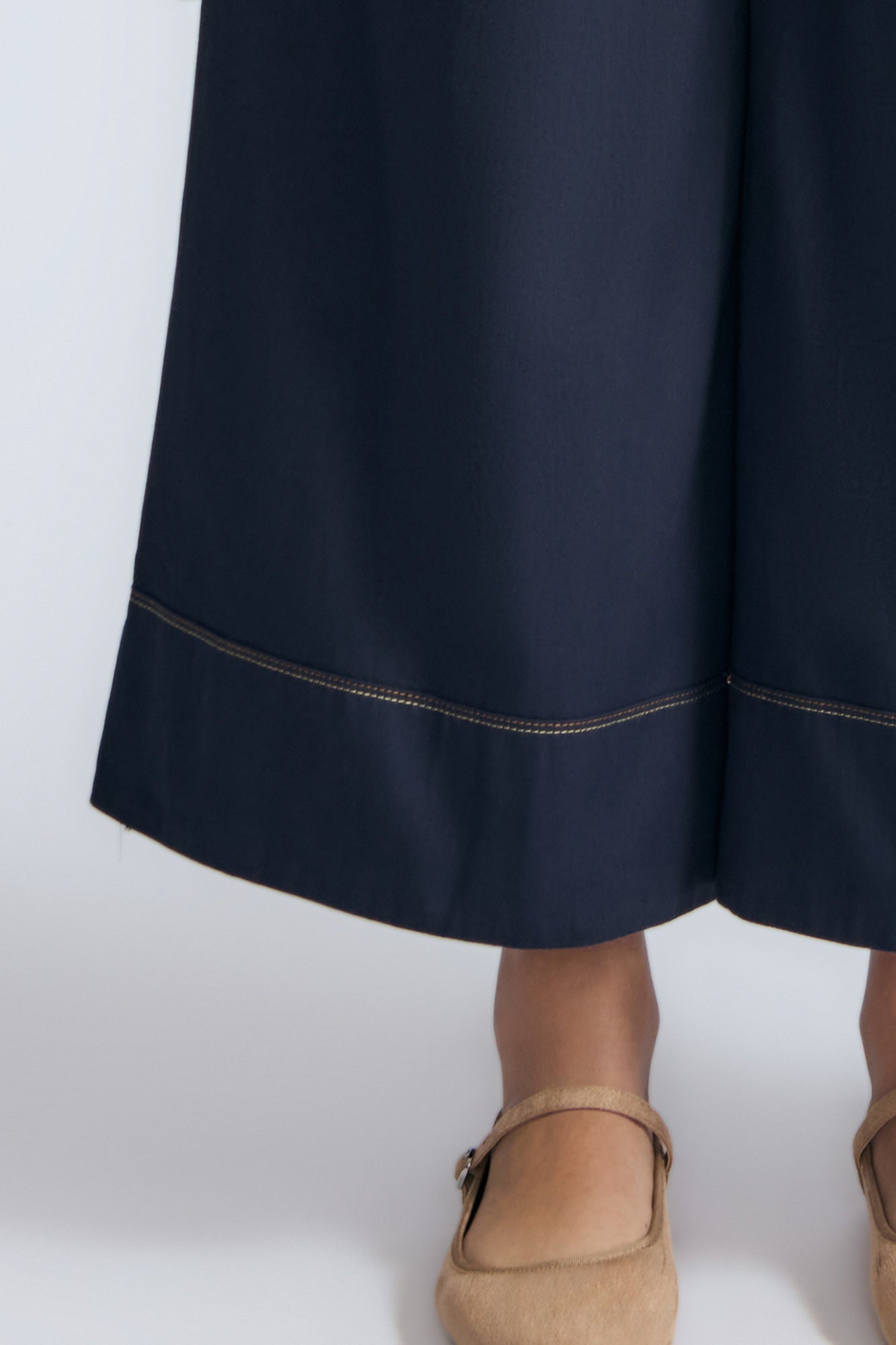 Belen Pant in Navy – Cotton palazzo trousers with side patch pockets, metal buckle details, and a wide waistband.