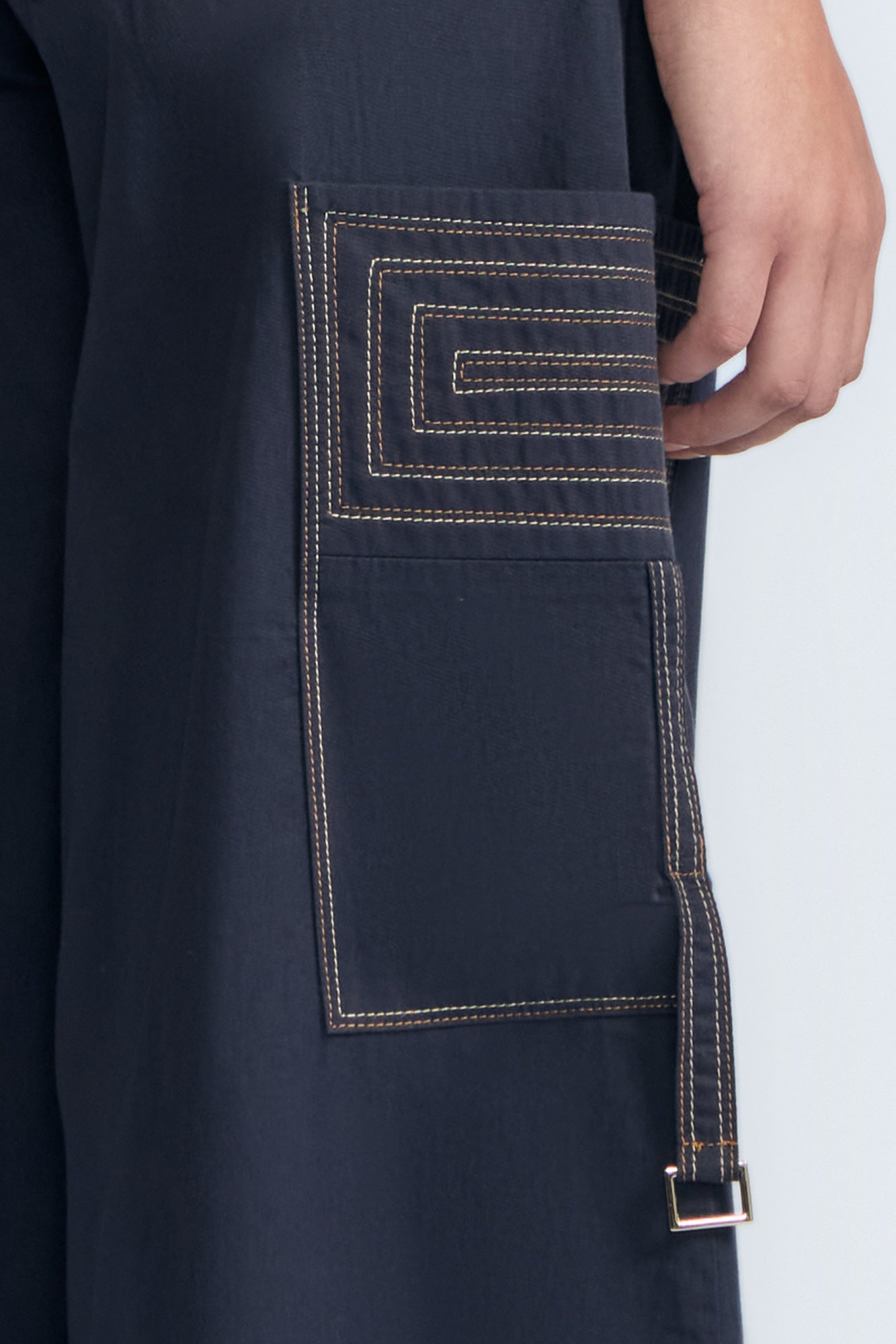 Belen Pant in Navy – Cotton palazzo trousers with side patch pockets, metal buckle details, and a wide waistband.