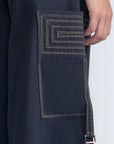 Belen Pant in Navy – Cotton palazzo trousers with side patch pockets, metal buckle details, and a wide waistband.