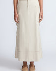 Belen Skirt in Prestine – Cotton maxi skirt with patch pockets, buckle straps, wide waistband, and contrast stitching.
