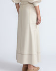 Belen Skirt in Prestine – Cotton maxi skirt with patch pockets, buckle straps, wide waistband, and contrast stitching.