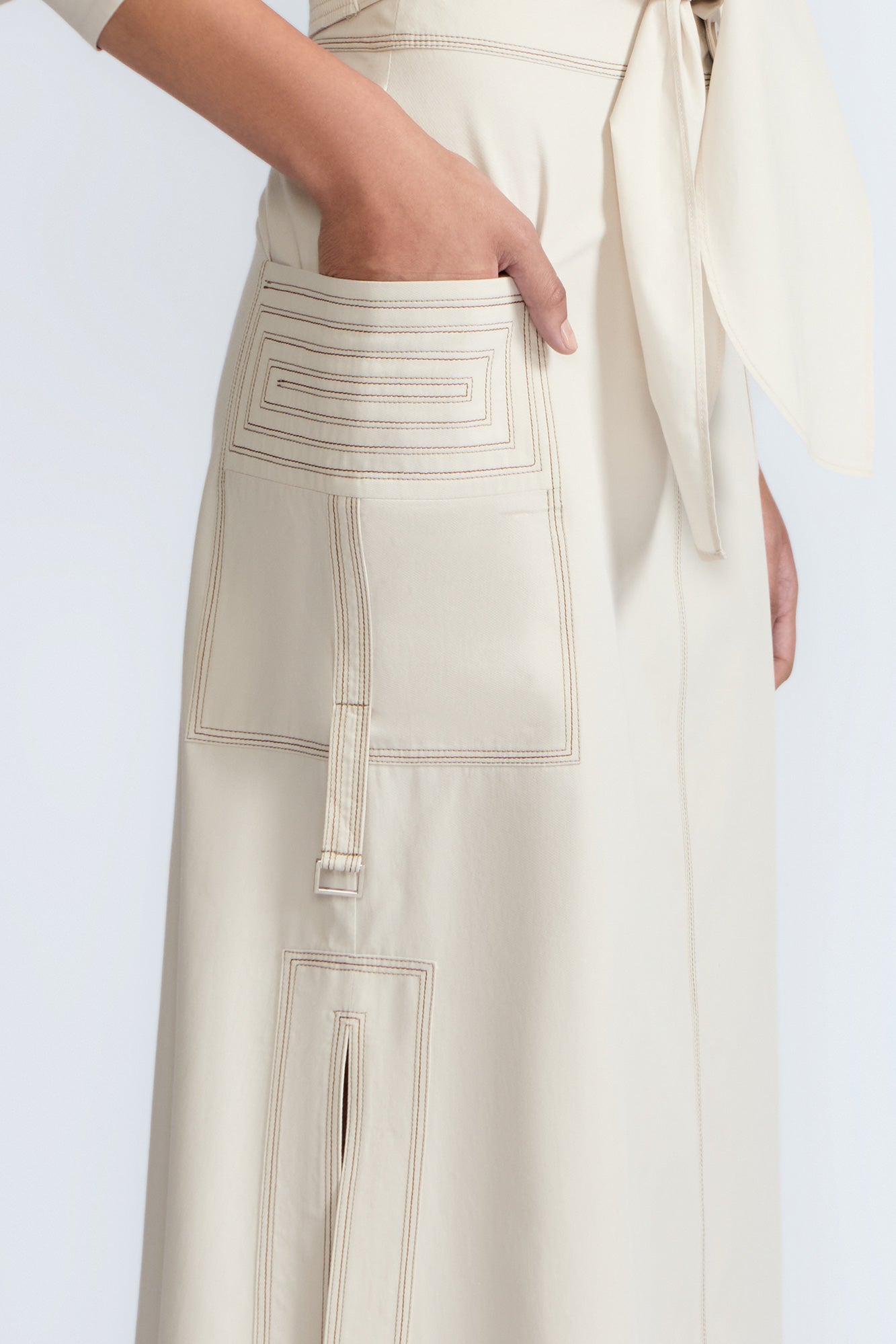 Belen Skirt in Prestine – Cotton maxi skirt with patch pockets, buckle straps, wide waistband, and contrast stitching.