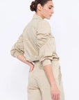 Elegant back view of the Bimba Blouse in its refined silhouette.