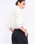 Elegant back view of the classic white Bimba Blouse.