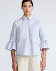 Callie Blouse – 100% cotton shirt blouse with hidden buttons, ¾ sleeves, and smocked cuffs and pockets. Made in Peru.