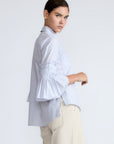 Callie Blouse – 100% cotton shirt blouse with hidden buttons, ¾ sleeves, and smocked cuffs and pockets. Made in Peru.