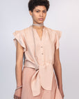 Chaya silk blouse in blush with a V-neckline and waist tie